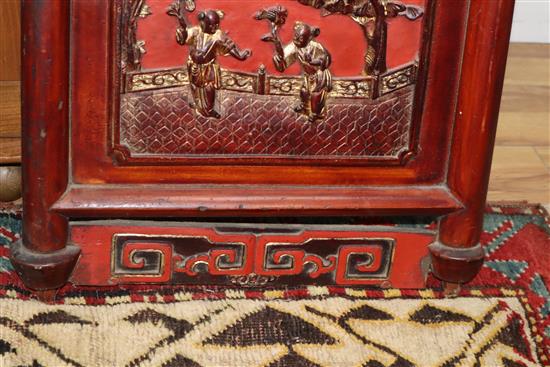 A pair of 19th century Chinese carved wood and glazed panels W.40cm